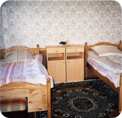 Two twin beds with nightstands